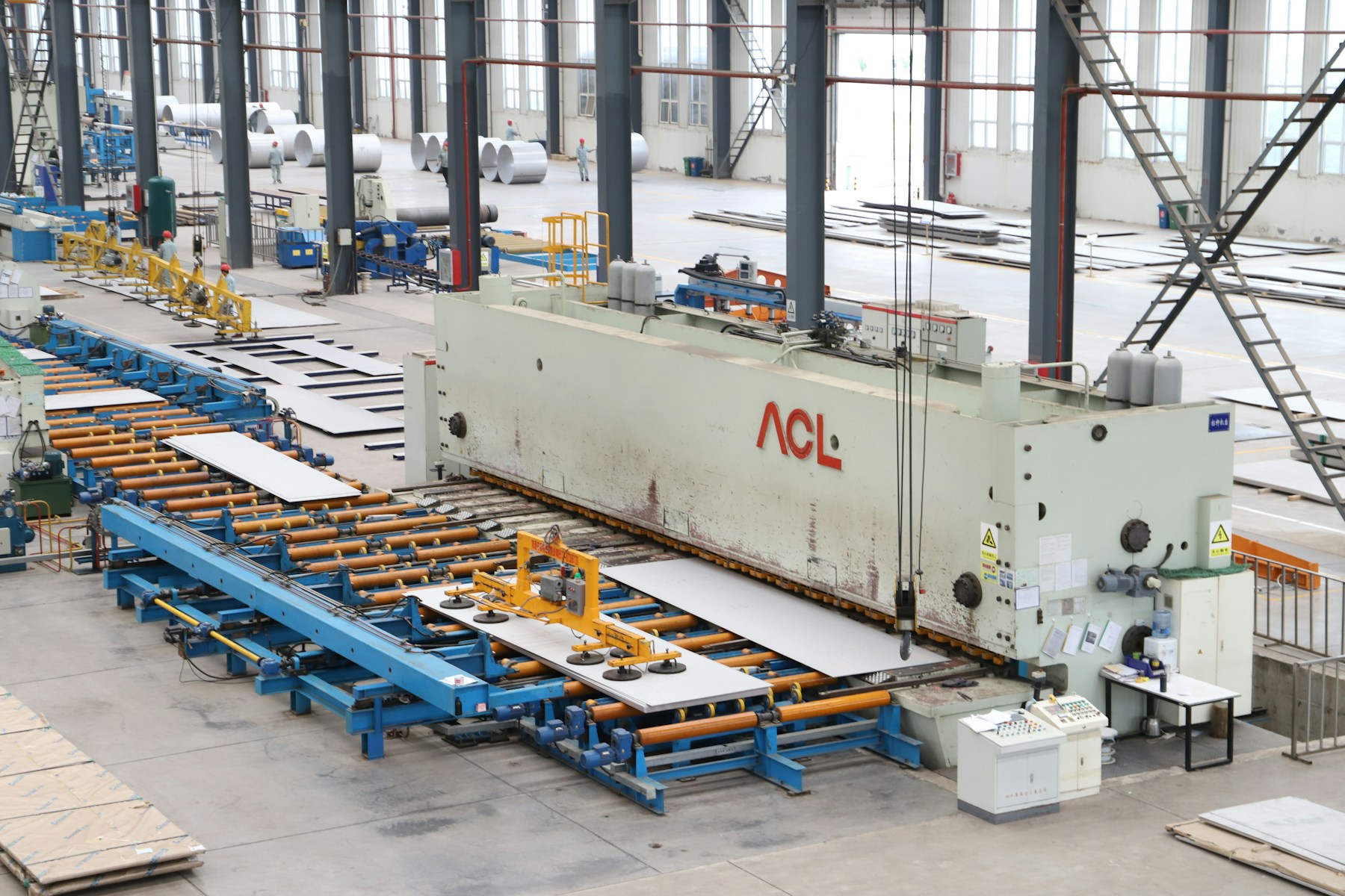 Heavy industrial machinery and production equipment inside a factory
