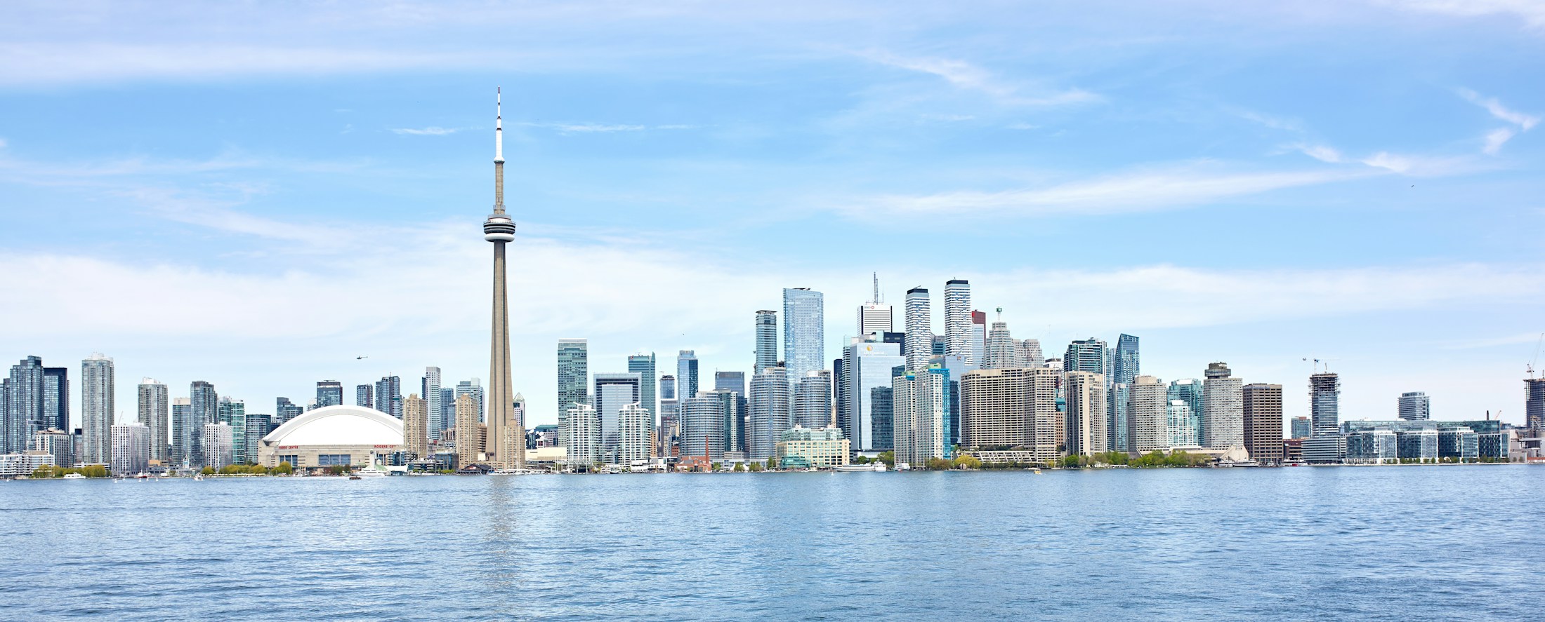 Waterfront city skyline viewed across the lake